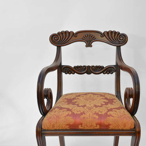 Regency mahogany sabre leg armchair